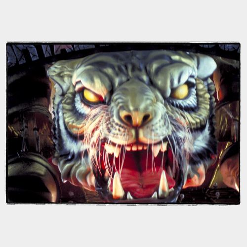 Huge angry looking tiger mask is a float in Rio Carnival
