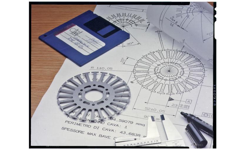 Mixup of new and old technologies. The computer eroding power from the manual design