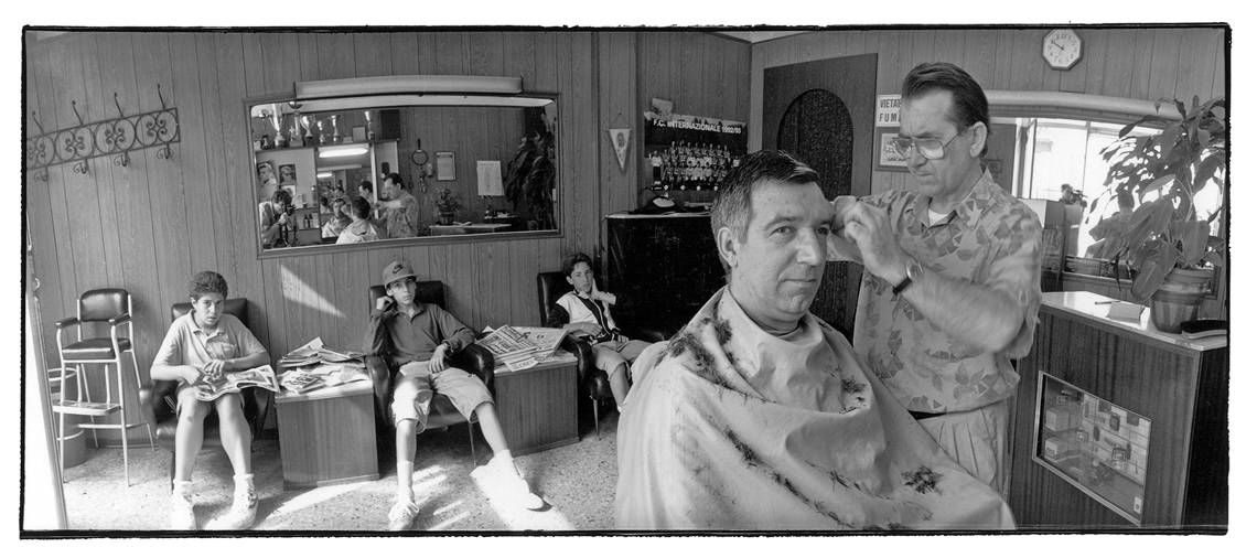 Barber at work - Torino, Italy