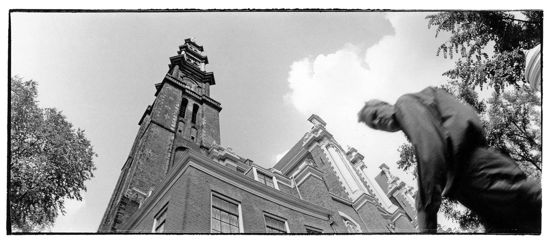 Amsterdam - impromptu cyclist portrait in front of buildings