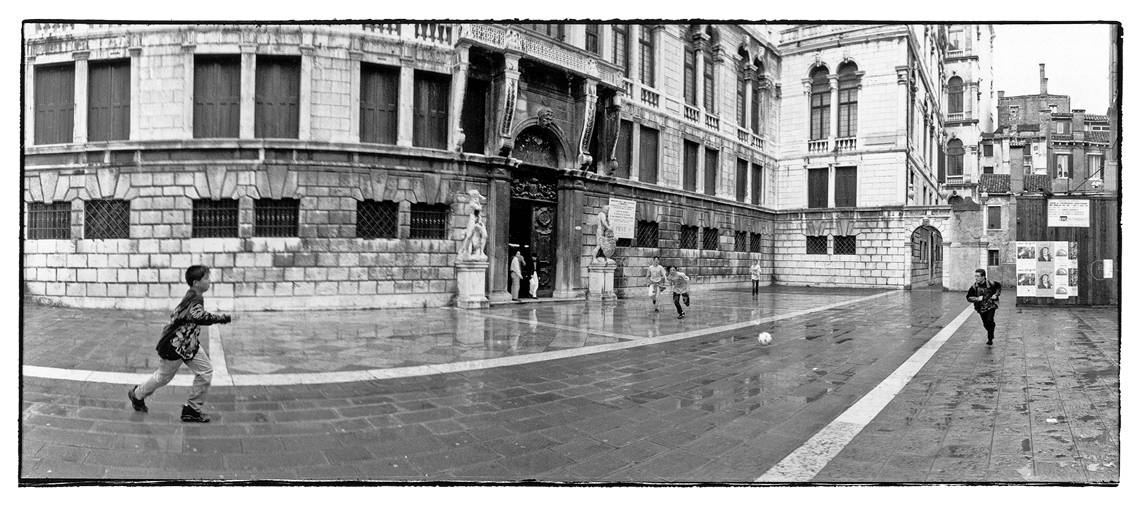 Soccer playing in Venice street