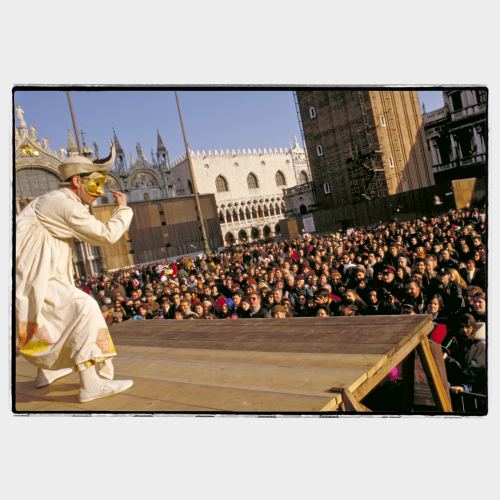 Venice: actor on stage in front of big crowd in San Marco's square