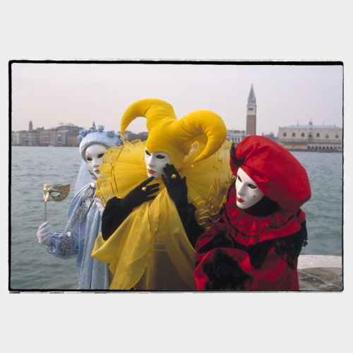 Three carnival masks on the Venice background
