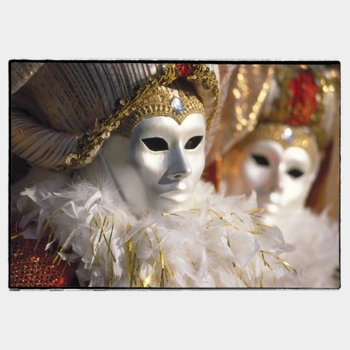 Venice: close-up of two masked persons